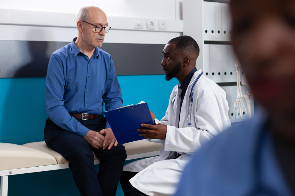 Doctor consulting with executive patient