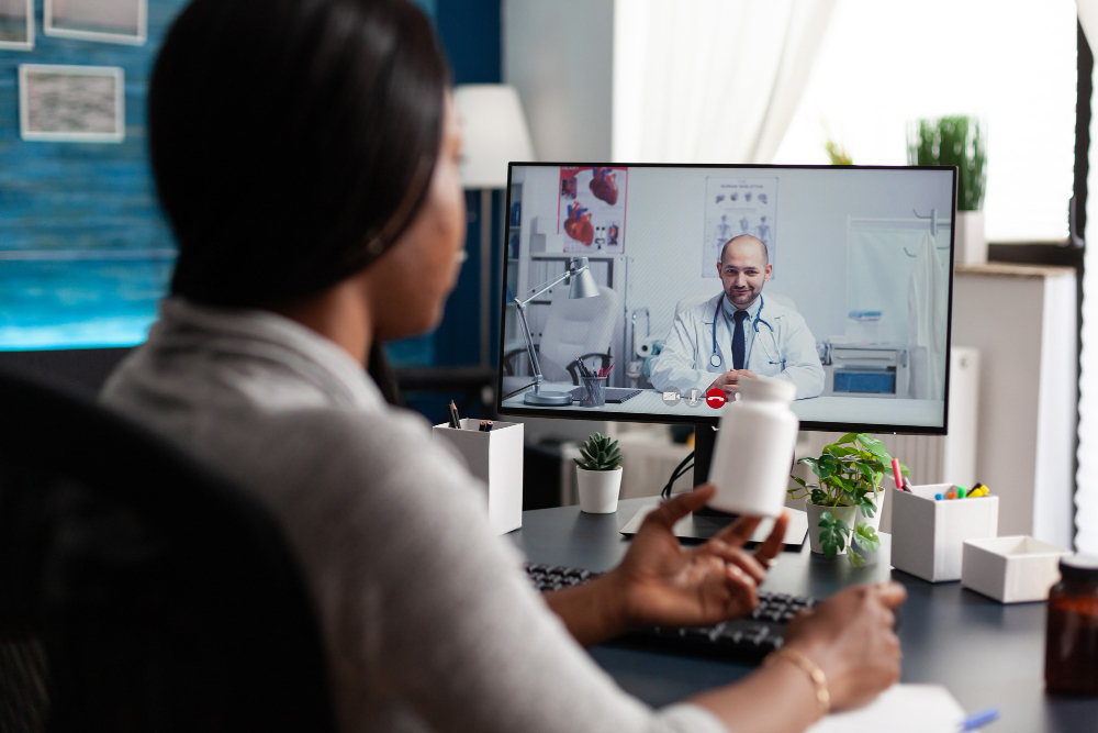 Doctor conducting telehealth visit on tablet